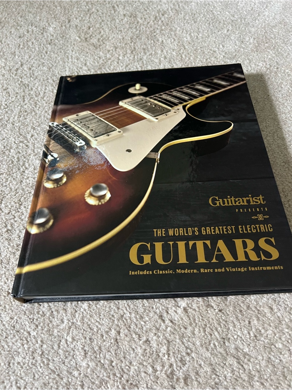 Guitars Hardcover Coffee Table Book - Black Cover, in great condition